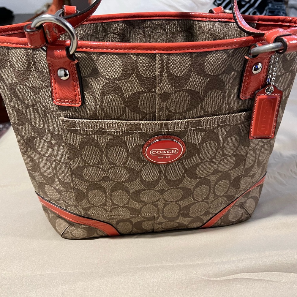 Authentic Coach Bag beige with orange . Condition almost new